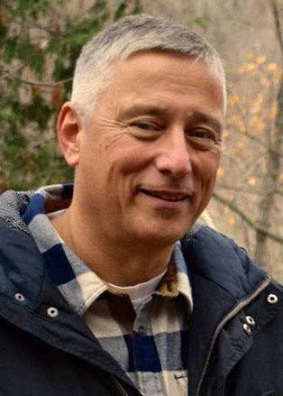 John Riley, Assistant Director